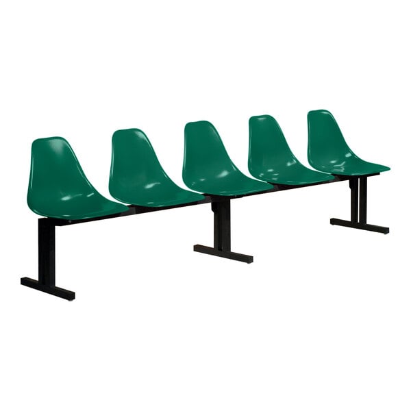 A row of four Sol-O-Matic green plastic chairs with black bases.