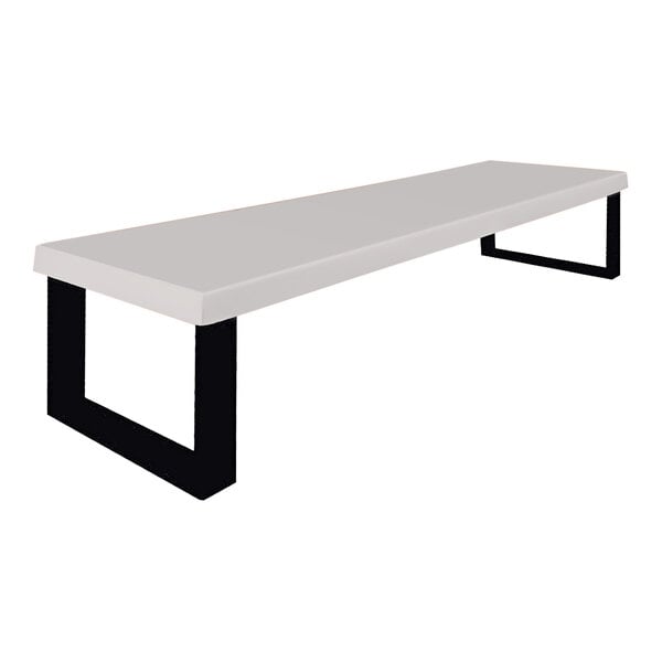 A platinum Sol-O-Matic fiberglass park bench with black legs.