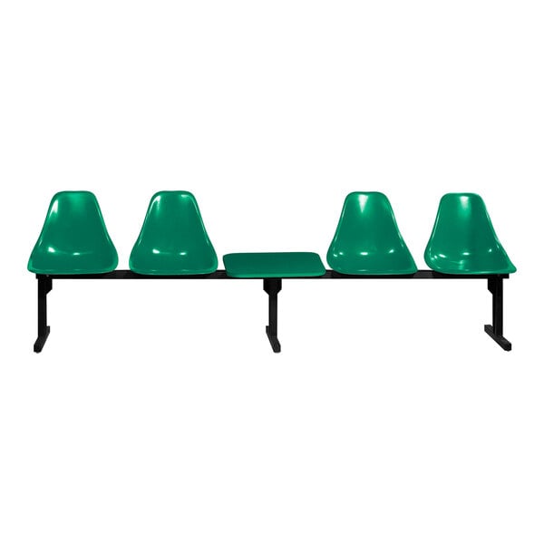 A Sol-O-Matic hunter green modular seating unit with black legs and a table.
