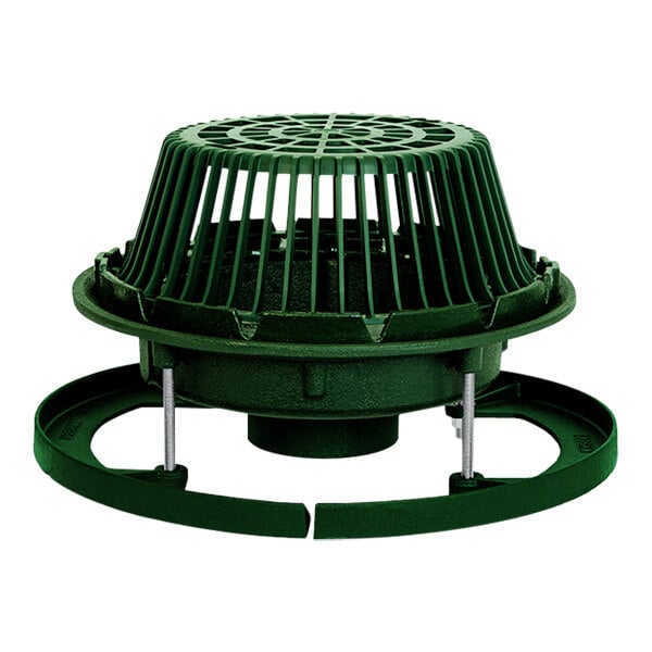 A green plastic roof drain cover with a cast iron base.