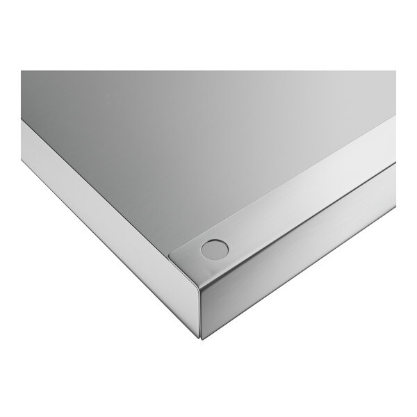 A stainless steel square plate with a sliding lid.