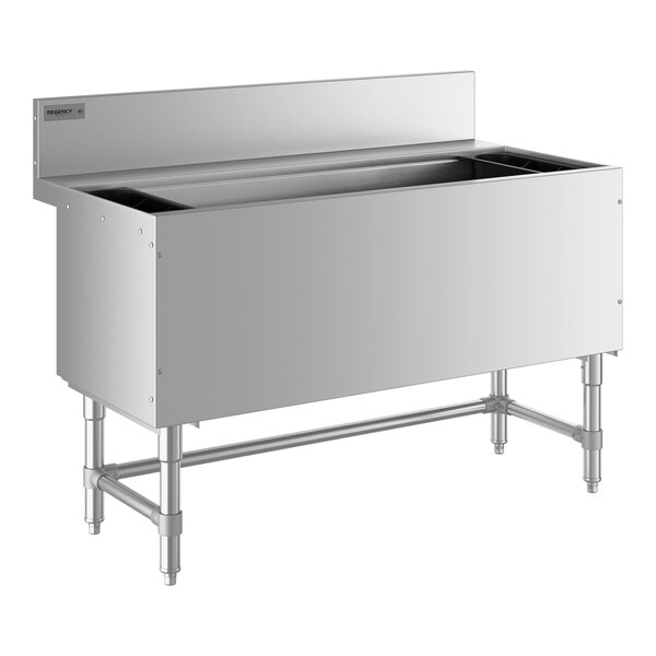 A Regency stainless steel underbar ice bin with a metal surface and bottle holders.
