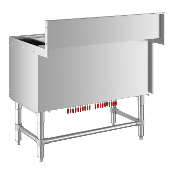 A Regency stainless steel underbar ice bin with red tubing and bottle holders.