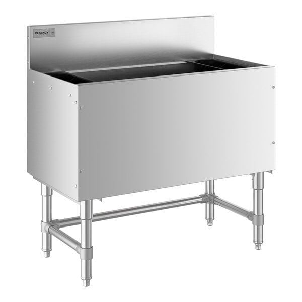 A Regency stainless steel underbar ice bin with a cold plate and bottle holders.