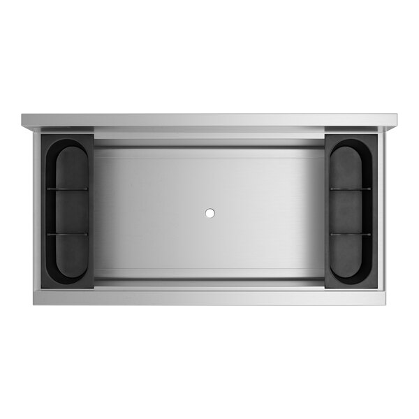 A stainless steel rectangular Regency underbar ice bin with a cold plate and bottle holders.