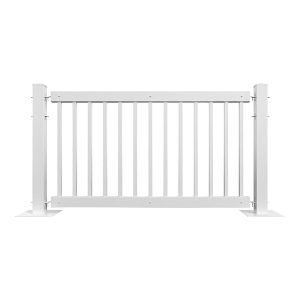 A white Mod-Traditional metal fence with metal posts.