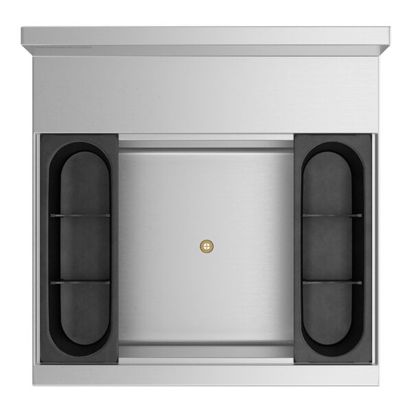 A silver rectangular Regency underbar ice bin with two black objects inside.