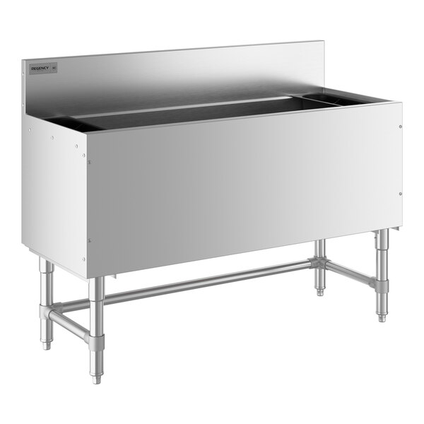 A stainless steel Regency underbar ice bin with a metal surface and bottle holders.