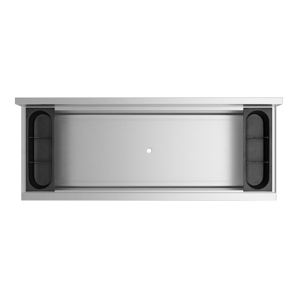 A top view of a stainless steel Regency ice bin with bottle holders and a cold plate.