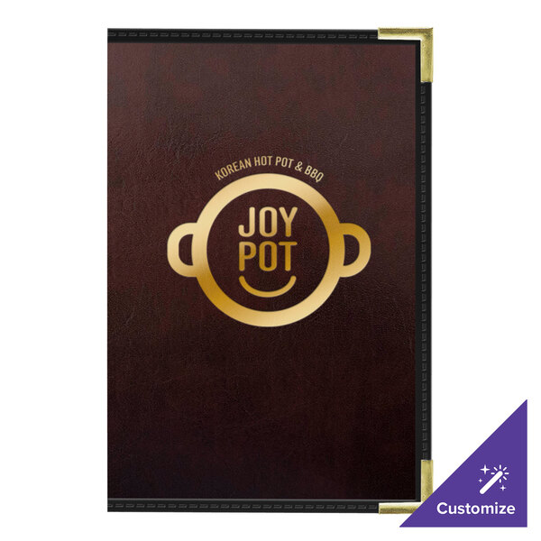 A brown leather H. Risch, Inc. wine menu cover on a table.