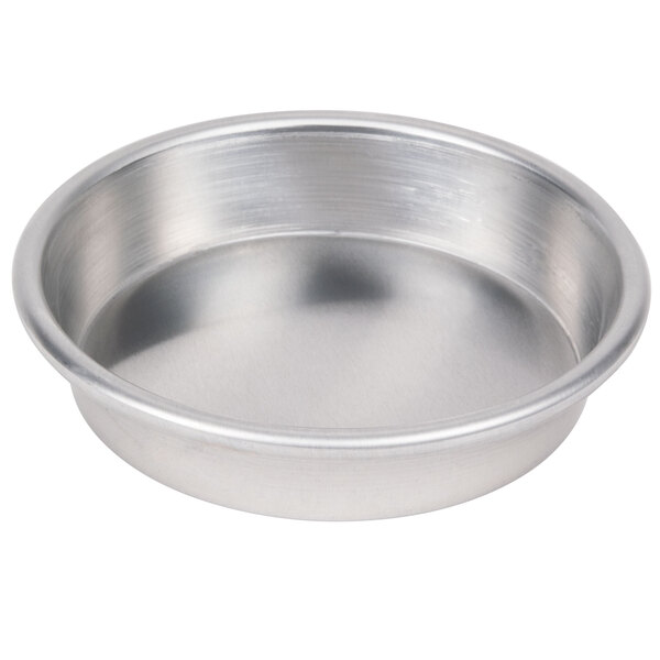 An American Metalcraft heavy weight aluminum pizza pan with a white background.
