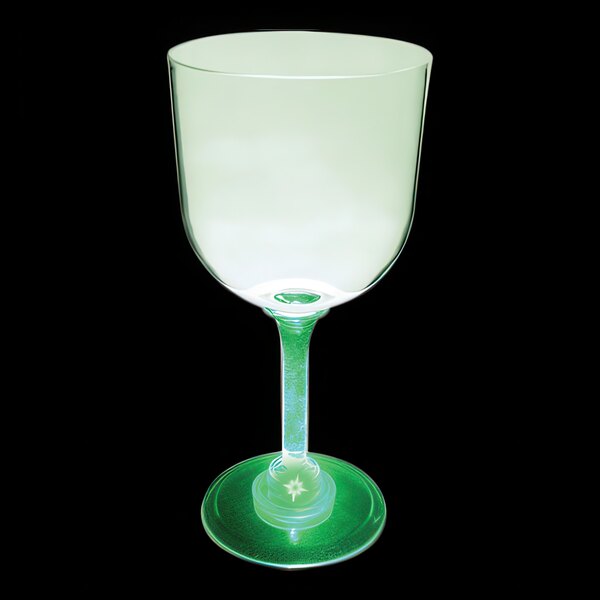 A close-up of a customizable plastic goblet with a green LED light inside.