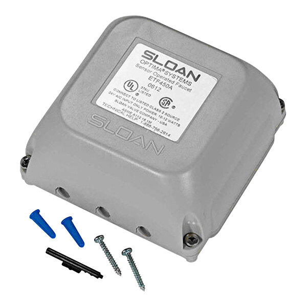 A grey Sloan faucet control module box with screws.