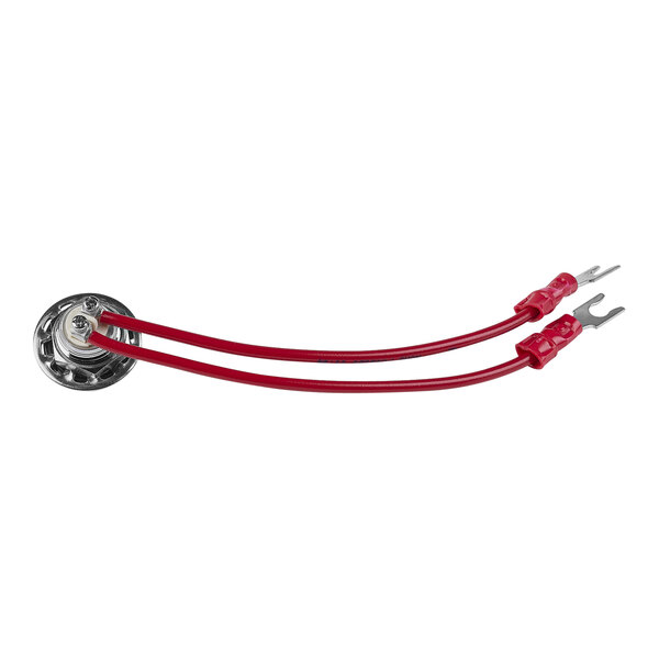 A red cable connected to a round metal object.