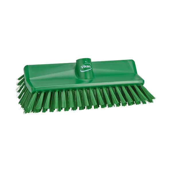 A green brush head with medium stiff bristles.