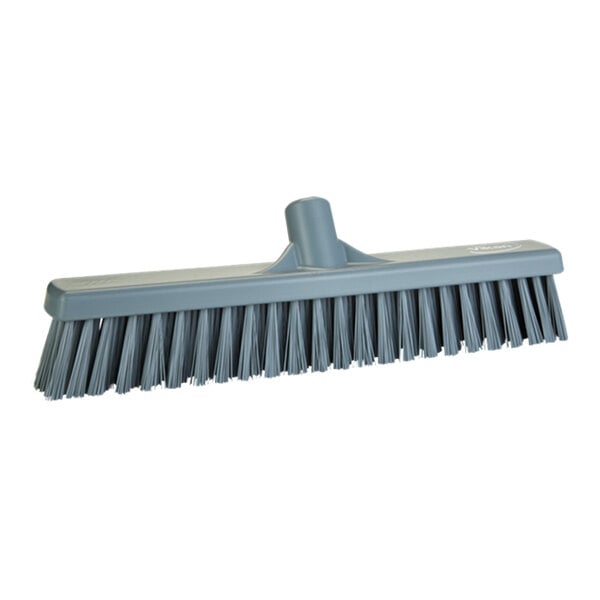 A Vikan gray push broom head.