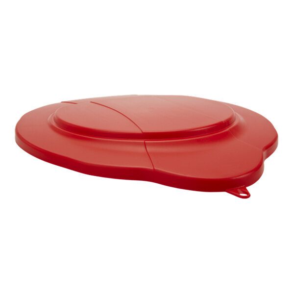 A red plastic lid with a curved edge.