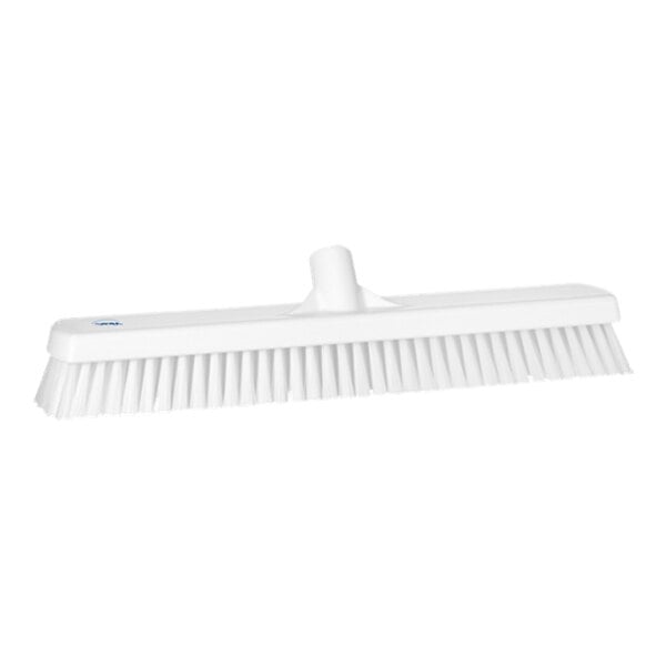 A Vikan white wall / floor scrub head with stiff bristles.