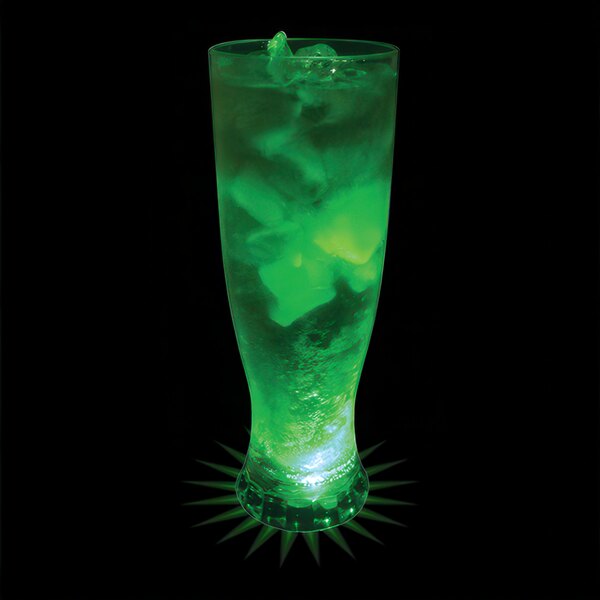 A customizable 22 oz. plastic pilsner cup with green liquid and ice.