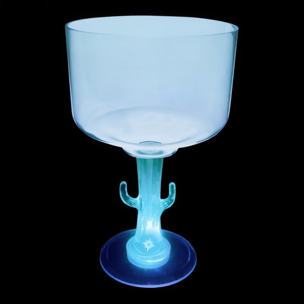 A clear plastic margarita cup with a cactus shaped stem and a blue light on it.