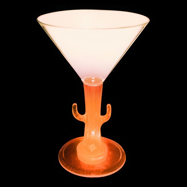 A close up of a 7 oz. plastic martini glass with a cactus-shaped stem with an orange LED light inside.