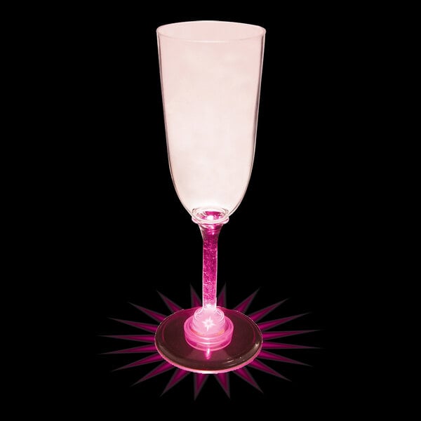 A customizable plastic champagne cup with a pink LED light.