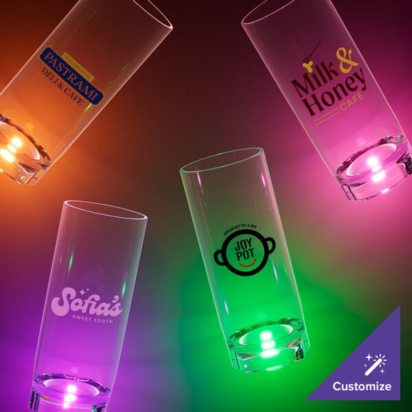 A close-up of a customizable plastic cup with a pink LED light.