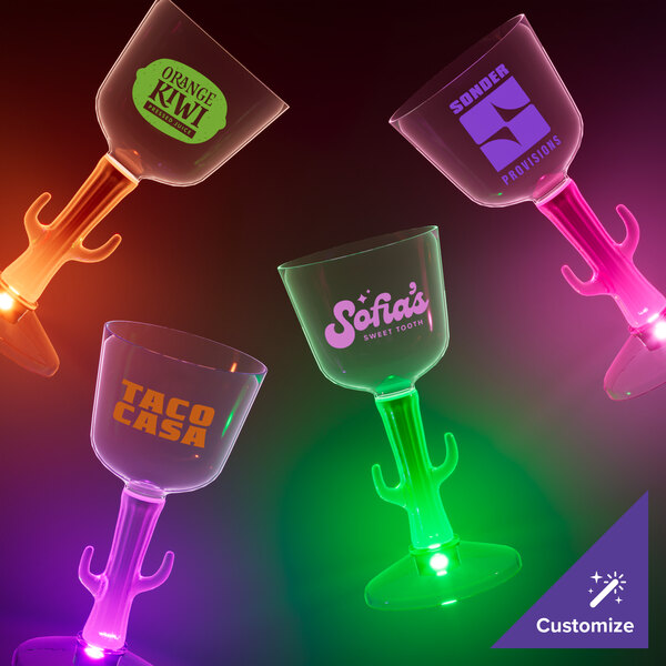 A group of customizable cactus stem wine glasses with pink, green, and purple LED lights.