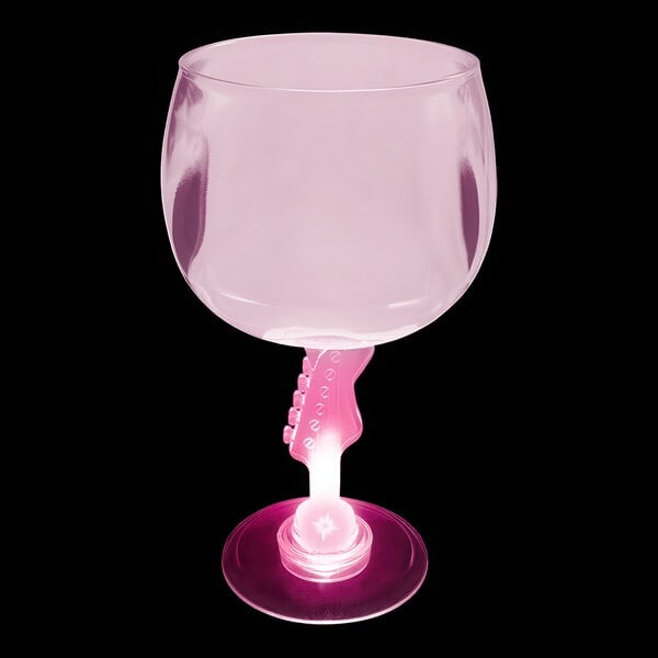 A pink plastic guitar stem goblet with a pink handle.