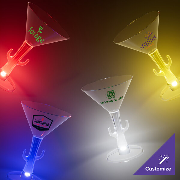 Three clear plastic martini glasses with cactus shaped stems and red LED lights.