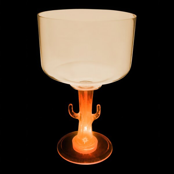 An 18 oz. plastic margarita cup with cactus shaped legs and an orange LED light.