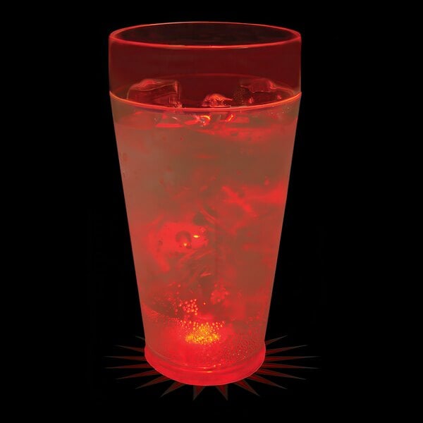 A customizable plastic cup with ice and red liquid, lit by a red LED light.