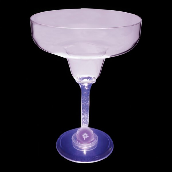 A clear plastic margarita glass with a purple rim and stem.