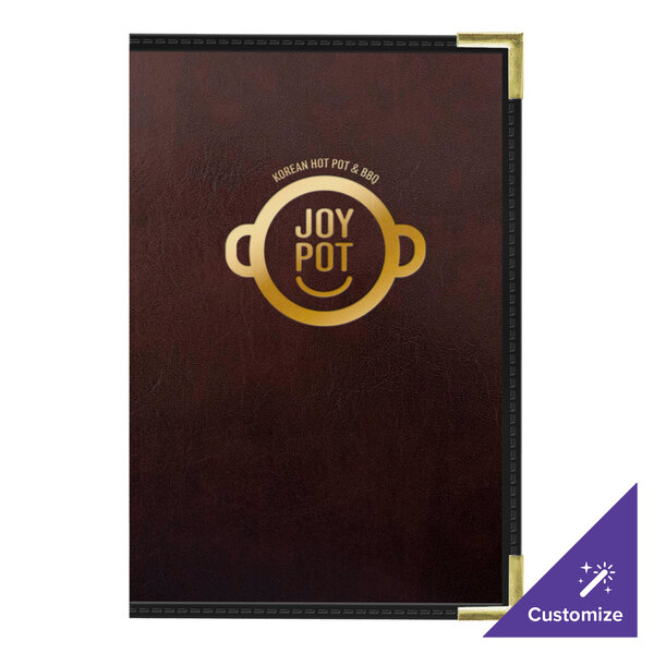 A brown leather H. Risch, Inc. menu cover on a table with a menu inside.