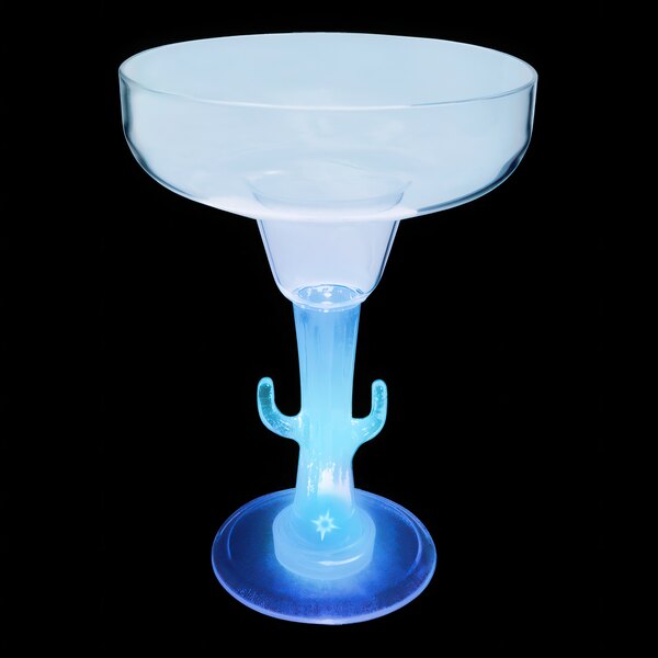 A clear plastic margarita cup with a cactus shaped stem and a light up base.