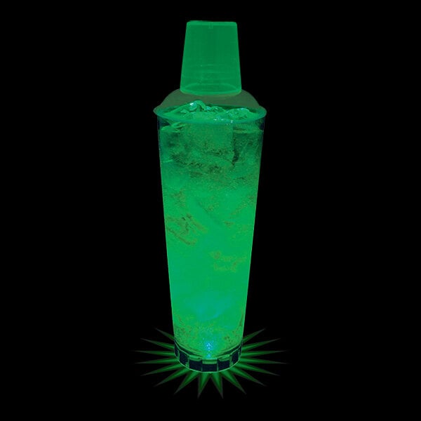 A customizable plastic shaker filled with a green drink and lit by a green LED light.