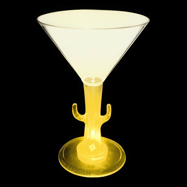 A yellow cactus shaped martini glass with a handle.