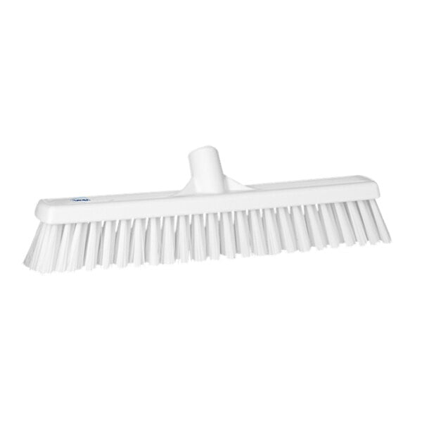 A white Vikan push broom head.