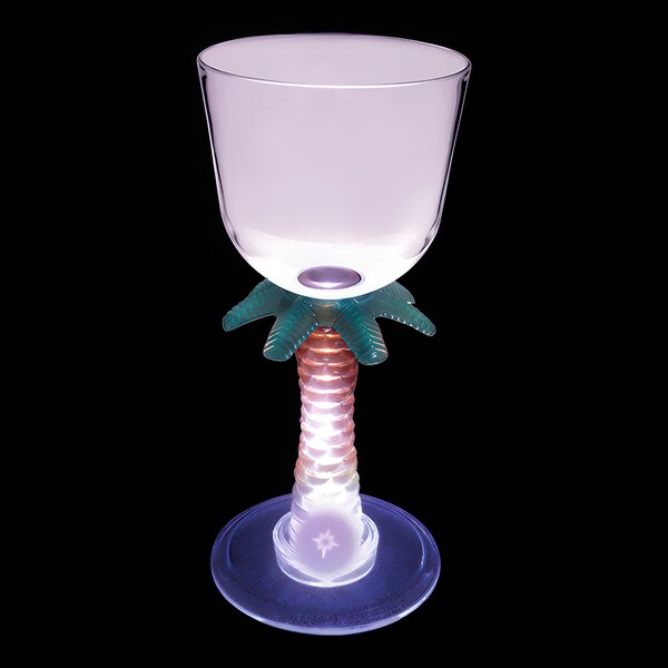 A clear plastic wine cup with a palm tree stem and a purple LED light.