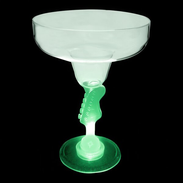 A clear plastic margarita glass with a guitar shaped stem and a green LED light.