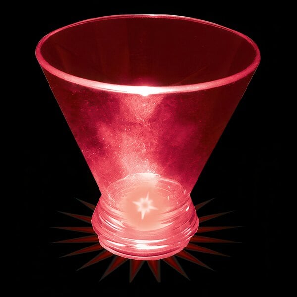 A red plastic stemless martini cup with a light inside.
