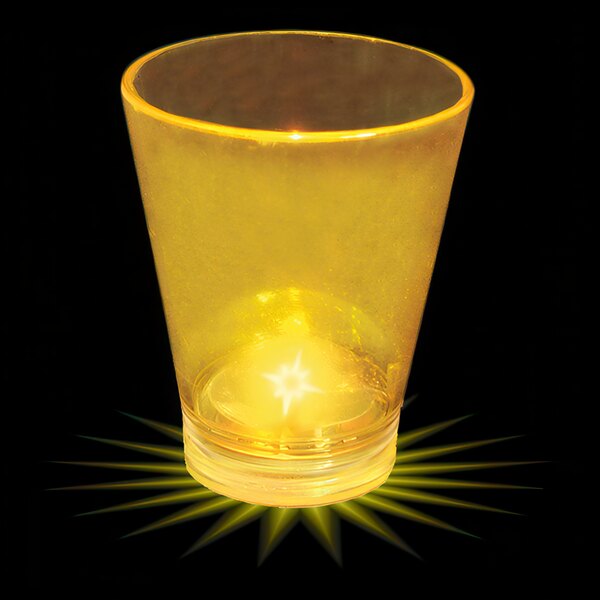 A yellow plastic shot cup with a yellow LED light inside.