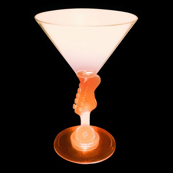 A 7 oz plastic martini glass with a guitar shaped stem and an orange LED light.