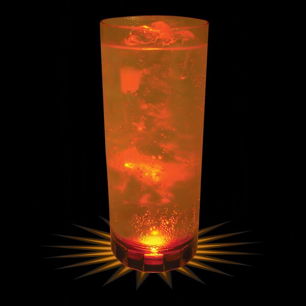 A 14 oz. plastic cup with an orange LED light inside filled with a drink.