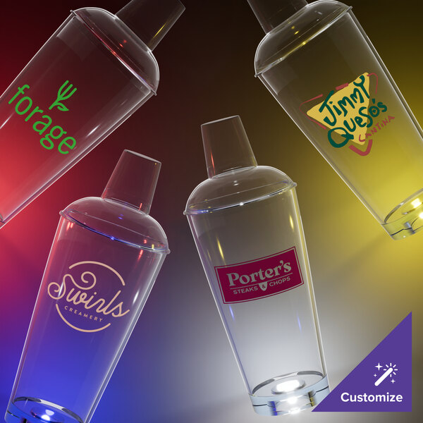 A 20 oz. customizable plastic cocktail shaker with a red LED light on a counter.