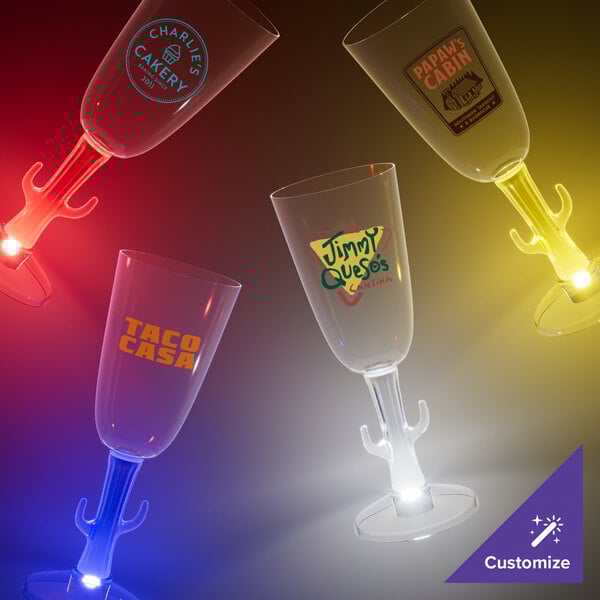 A customizable clear plastic champagne cup with a cactus shaped stem and a red LED light.