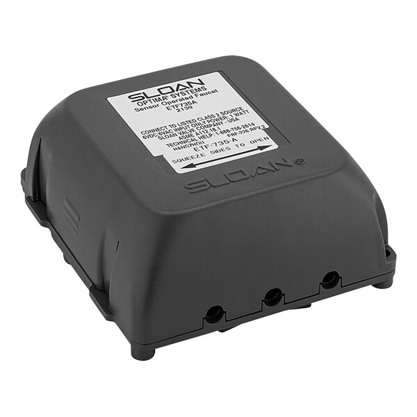 A black electronic device with a white label.