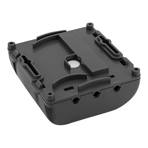 A black plastic Sloan faucet control module with two holes on the top.