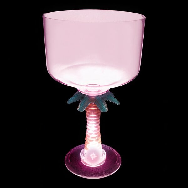 A clear plastic margarita cup with a pink LED light in the stem.