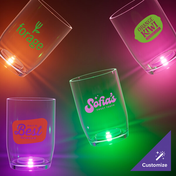 A close up of a customizable plastic stemless wine cup with a green LED light.
